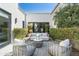 Private courtyard featuring a patio seating area, well-maintained landscaping, and gravel at 5858 E Caballo Dr, Paradise Valley, AZ 85253