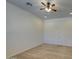 Spacious bedroom with neutral carpet, a ceiling fan, recessed lighting, and a double door closet at 6192 S Claiborne Ave, Gilbert, AZ 85298