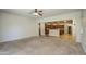 Open-concept living room with seamless flow into the kitchen, perfect for entertaining at 6192 S Claiborne Ave, Gilbert, AZ 85298