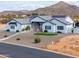 Beautiful single-Gathering home with desert landscaping, neutral color palette, and a charming facade, perfect for modern living at 6645 N Paint Ln, Casa Grande, AZ 85194