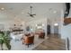 Bright open-concept living room featuring hardwood floors and contemporary furnishings at 6645 N Paint Ln, Casa Grande, AZ 85194