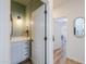 Stylish powder room with modern fixtures and decorative wall accents at 6645 N Paint Ln, Casa Grande, AZ 85194