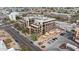 An aerial view of a contemporary condo complex boasting a central location, and stylish architecture at 7301 E 3Rd Ave # 101, Scottsdale, AZ 85251