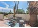 Private patio showcasing seating and an umbrella, ideal for enjoying the outdoors at 7350 N Via Paseo Del Sur -- # N104, Scottsdale, AZ 85258