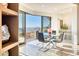 Elegant dining area with mountain views and natural light streaming through large windows at 7701 N Silvercrest Way, Paradise Valley, AZ 85253