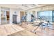 The home gym includes floor to ceiling mirrors, exercise equipment and views of the city skyline at 7701 N Silvercrest Way, Paradise Valley, AZ 85253