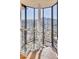 A spiral staircase features a central column, glass windows and city views at 7701 N Silvercrest Way, Paradise Valley, AZ 85253