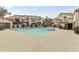 Exterior shot of the community pool and surrounding condominium buildings at 839 S Westwood -- # 273, Mesa, AZ 85210