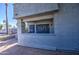 Pleasant condo exterior with desert landscaping, featuring a stucco facade at 10115 E Mountain View Rd # 1005, Scottsdale, AZ 85258
