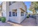 Well-maintained condo exterior with desert landscaping and view of neighboring building at 10115 E Mountain View Rd # 1005, Scottsdale, AZ 85258