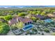 Aerial view of an estate showcasing a pool and a mountain view backdrop at 10561 E Addy Way, Scottsdale, AZ 85262