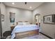 Charming bedroom with natural wood furniture, soft carpet, and neutral color palette at 10561 E Addy Way, Scottsdale, AZ 85262