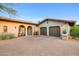 Stunning desert home with a three-car garage and private entry court at 10561 E Addy Way, Scottsdale, AZ 85262