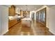Well-lit kitchen with a large island, wooden cabinets, and stainless steel appliances at 10561 E Addy Way, Scottsdale, AZ 85262