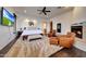 Inviting main bedroom with comfortable seating, fireplace, and stylish decor at 10561 E Addy Way, Scottsdale, AZ 85262