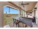 Inviting outdoor patio with mountain views, an outdoor kitchen, and a covered seating area at 10561 E Addy Way, Scottsdale, AZ 85262