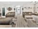 Spacious living area features modern decor and comfortable seating arrangements at 10780 W Woodland Ave, Avondale, AZ 85323