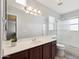 Bathroom features single sink, and neutral color scheme, with tub/shower combination at 11260 N 92Nd St # 2025, Scottsdale, AZ 85260
