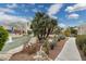 Community water feature with lush desert landscaping and a paved walkway at 11260 N 92Nd St # 2025, Scottsdale, AZ 85260