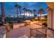 A wonderful back patio featuring a fire place and a gorgeous view of the golf course at 13221 W Rincon Dr, Sun City West, AZ 85375