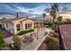 The backyard features a pool, spa, outdoor seating, and landscaping with mature trees at 13221 W Rincon Dr, Sun City West, AZ 85375