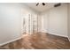 Bedroom with doorways leading to a bathroom and walk-in closet at 13221 W Rincon Dr, Sun City West, AZ 85375
