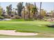 Manicured golf course view with sand traps and verdant turf under a sunny sky at 13221 W Rincon Dr, Sun City West, AZ 85375