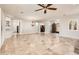 Open living area showcasing the transition to the kitchen and entrance hall at 13221 W Rincon Dr, Sun City West, AZ 85375