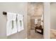 Elegant tiled shower with a bench, shower niche, and decorative accent tiles at 13221 W Rincon Dr, Sun City West, AZ 85375