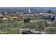 Scenic community view featuring lush landscaping and a water fountain, with a mountain backdrop at 13227 N Mimosa Dr # 107, Fountain Hills, AZ 85268