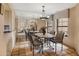 Elegant dining room with tiled flooring, mirrored wall, and seating for eight at 13227 N Mimosa Dr # 107, Fountain Hills, AZ 85268