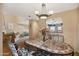Inviting dining area with large table and easy access to the kitchen and living spaces at 13227 N Mimosa Dr # 107, Fountain Hills, AZ 85268