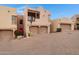 Southwestern style home with two-car garage and desert landscaping at 13227 N Mimosa Dr # 107, Fountain Hills, AZ 85268