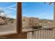 Balcony view with neighborhood buildings, pool and mountains in background at 13227 N Mimosa Dr # 107, Fountain Hills, AZ 85268