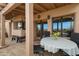 Cozy covered patio featuring tiled floor, seating area, and access to the interior at 13227 N Mimosa Dr # 107, Fountain Hills, AZ 85268
