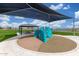 Playground features a climbing structure, providing a fun outdoor space for physical activity and community enjoyment at 13603 W Remuda Dr, Peoria, AZ 85383