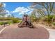 Community playground features a slide and climbing structure, offering a fun outdoor space for residents at 13603 W Remuda Dr, Peoria, AZ 85383