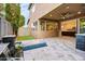 Spacious backyard patio with built-in kitchen, fire pit, and water feature at 1372 N Zane Dr, Chandler, AZ 85226