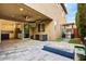 Expansive outdoor patio with built-in kitchen, TV, and cozy fire pit at 1372 N Zane Dr, Chandler, AZ 85226