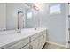 Bathroom featuring a double sink vanity with ample counter space, and a large mirror at 1372 N Zane Dr, Chandler, AZ 85226