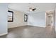 Large bedroom featuring an accent wall and three windows allowing ample natural light at 1372 N Zane Dr, Chandler, AZ 85226