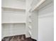 Walk in closet with carpet flooring and built-in shelving and rods at 1372 N Zane Dr, Chandler, AZ 85226