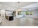 Bright kitchen with a large island, stainless appliances, and open to living space at 1372 N Zane Dr, Chandler, AZ 85226