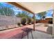 Covered patio with brick and concrete, perfect for enjoying the beautiful backyard scenery at 1510 E Wescott Dr, Phoenix, AZ 85024