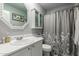Bathroom with vanity, tiled shower and white fixtures at 1622 E Silverbirch Ave, Buckeye, AZ 85326