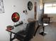 Bright home office with a glass top desk, a ceiling fan and comfortable office chair at 16624 E Palisades Blvd # 101, Fountain Hills, AZ 85268