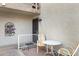 Cozy patio space with chairs and table, perfect for relaxing outdoors at 16624 E Palisades Blvd # 101, Fountain Hills, AZ 85268