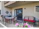 Cozy patio with outdoor seating, BBQ, and sliding glass door access to the interior at 16624 E Palisades Blvd # 101, Fountain Hills, AZ 85268