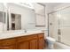 Bathroom with a vanity, toilet, and glass door shower, reflecting neutral colors at 1805 E Sagebrush St, Gilbert, AZ 85296