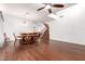 Spacious dining room showcasing wood flooring, chandelier and a staircase at 1805 E Sagebrush St, Gilbert, AZ 85296